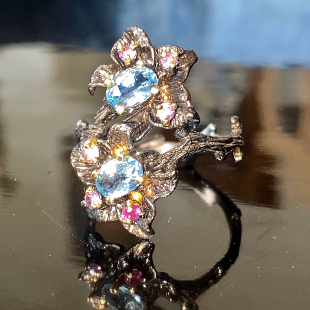 Genuine Blue Topaz And Amethyst Ring
